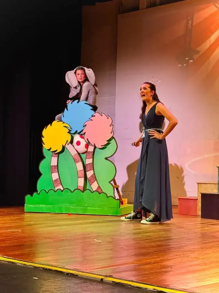 A senior student performing a solo
